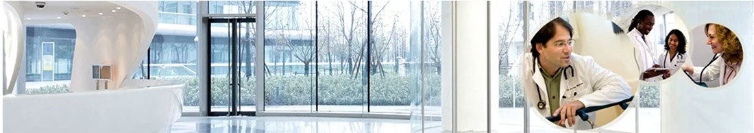 Modern medical facility's bright, spacious lobby with a large revolving door. Inset images show medical professionals engaged in conversation and patient care tasks.