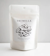 Tremella Mushroom Powder 2 oz. | 50 servings, rich in antioxidants, in a bag on a white surface from Faire.com.