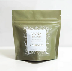 A bag of Fine Plant & Mushroom Powder 2 oz. by Faire.com sits on a white surface.