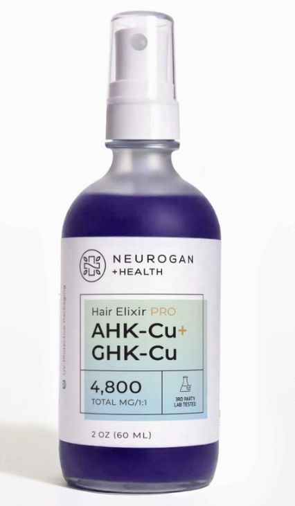 A 2 oz purple serum bottle labeled "Faire.com Ahk-Cu + Ghk-Cu Hair Elixer Pro Serum, 4,800 mg, copper peptide, third-party lab tested.