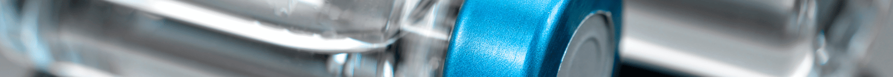 A close up of a silver and blue bicycle.