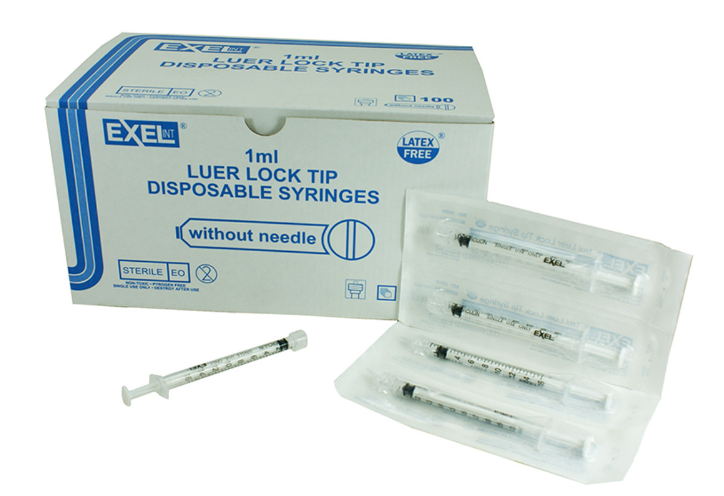 Box labeled "MedPlus Exel 1cc (1ml) Luer-Lock Syringe - NO NEEDLE (50 pack)" beside five individually wrapped syringes with one unwrapped syringe in front.