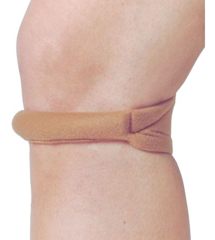 A woman's knee with the Cho-Pat Original Knee Strap - Medium (12 1/2" - 14 1/2") Beige by HealthyKin around her patellar tendon for improved patellar tracking.