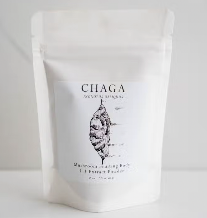 A bag of Faire.com Chaga Mushroom Powder 2 oz. | 50 servings on a white surface.