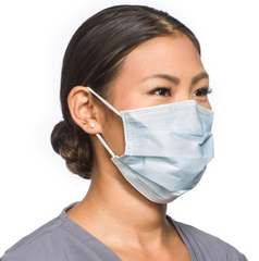 Woman wearing a MedPlus Fluidshield* Level 2 Procedure Mask with a fluid-resistant outer layer.