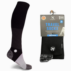 A pair of Extreme Fit Travel Socks (SMALL/MEDIUM) from Faire.com with the words "travel socks" on them. Ideal for enhancing blood circulation during long journeys.