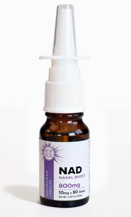 Brown glass bottle labeled "NAD Intra Nasal Spray - Nasal Boost 800 mg/0.34 oz." by Faire.com, featuring a white nasal spray nozzle and offering 80 doses to help support cellular energy.