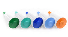 Five different colored HealthyKin plastic syringes, including blue and green, on a white background.