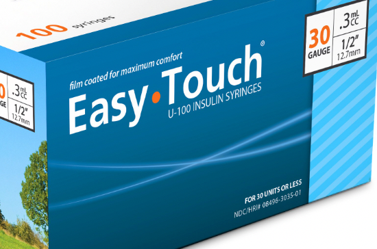 A box of EasyTouch Insulin Syringes 0.3cc (0.3ml) x 30G x 1/2" - 1 BOX (100 SYRINGES) by MHC on a grassy field, offering comfortable and easy-to-use feminine hygiene.